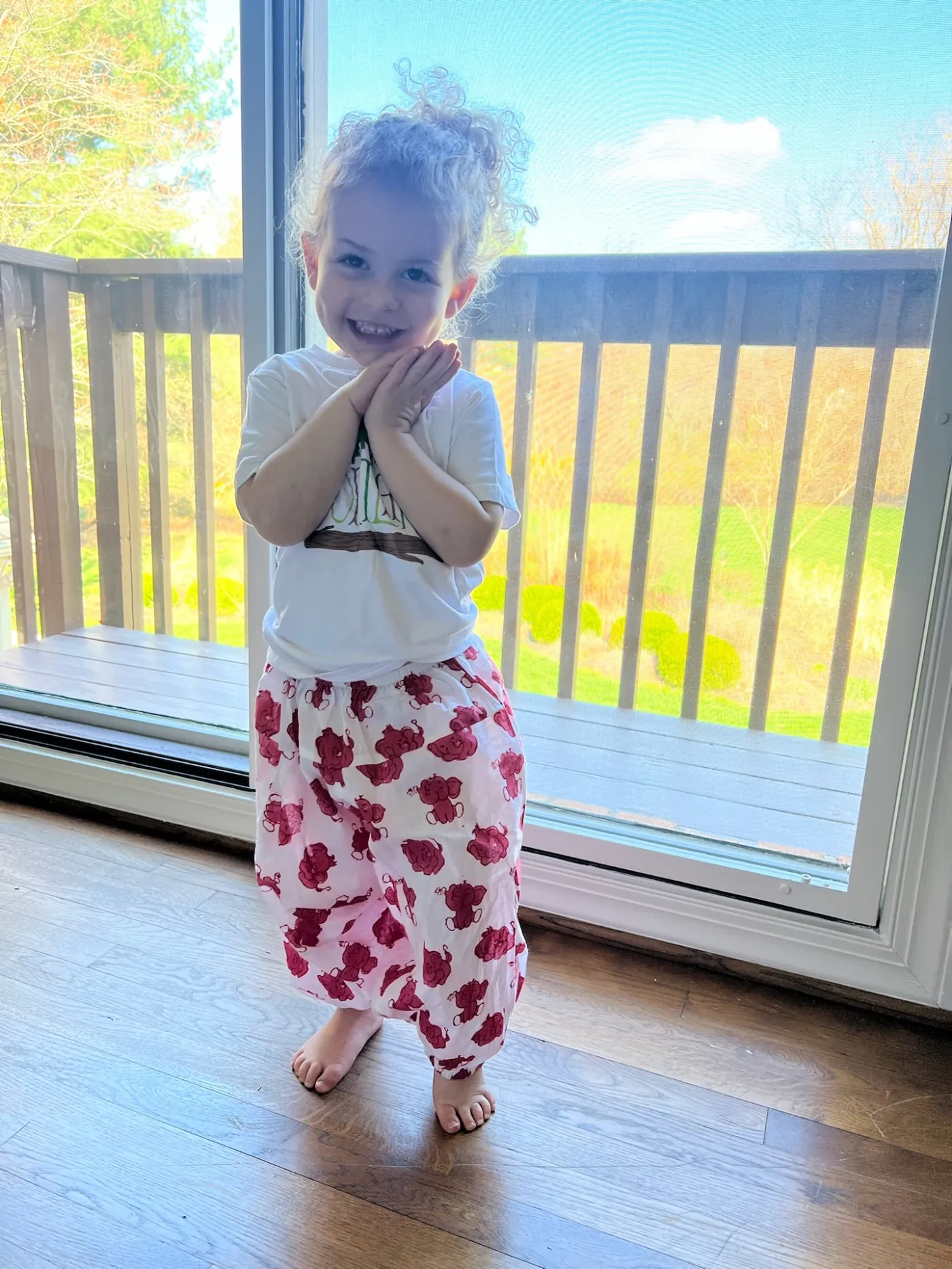 Smiling toddler wearing Little Elephant 100% cotton baby yoga pants